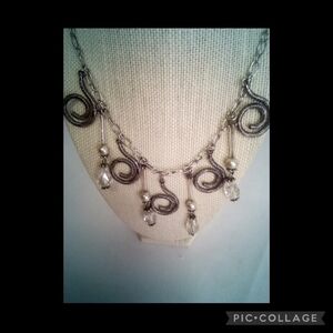 SLIVER swirl necklace